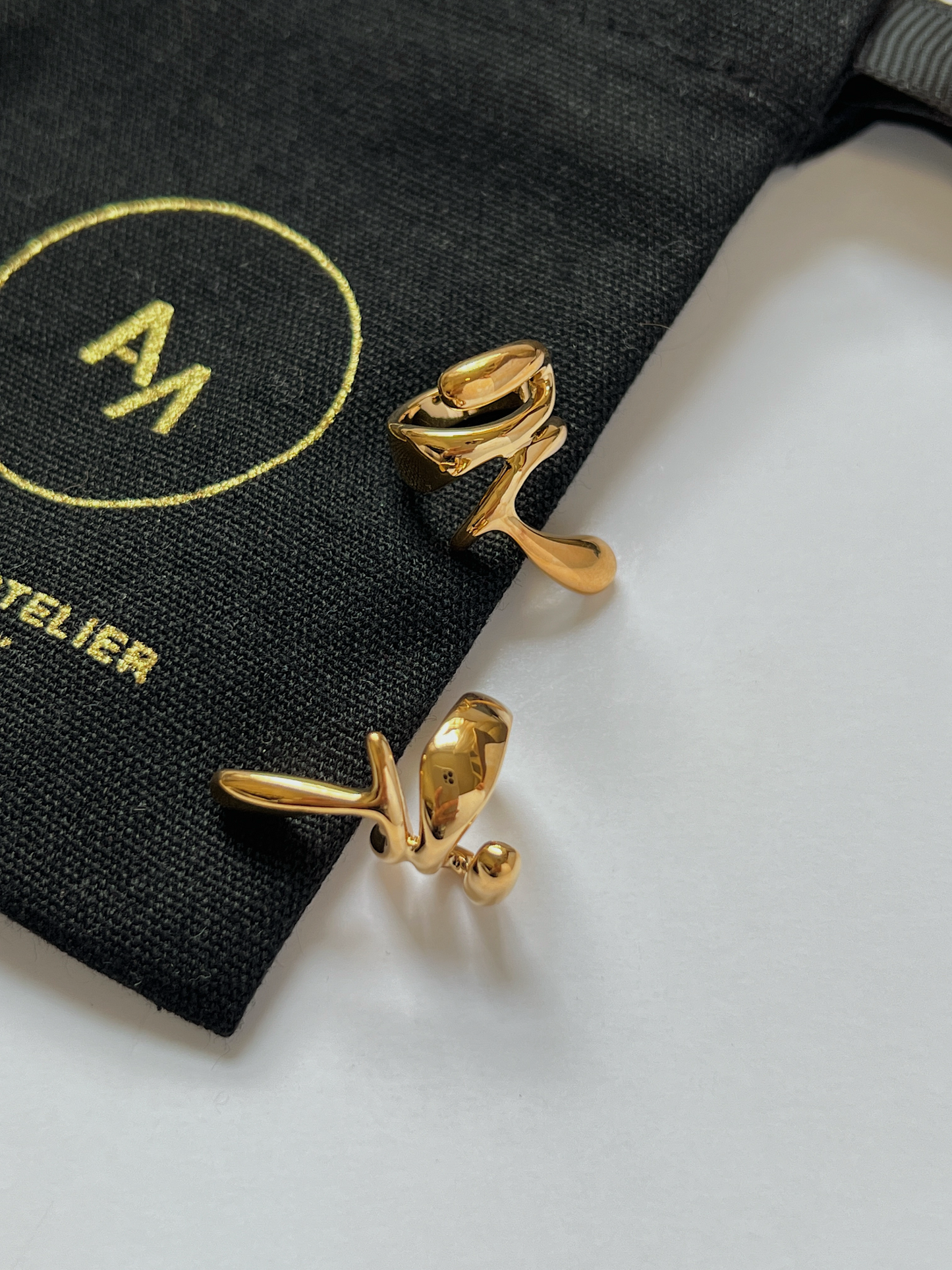 Trendy gold ear cuff, unique ear cuff design, stylish accessory for women, Aurous Atelier branded pouch with the Dylan abstract gold cuff.