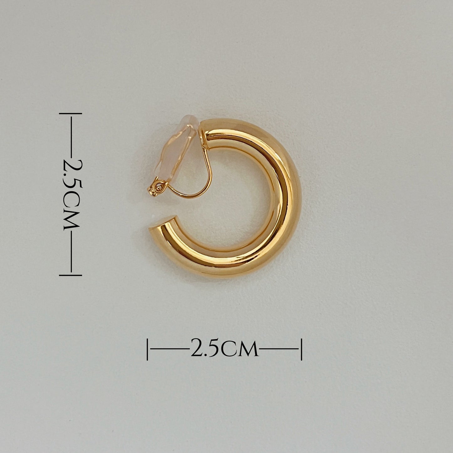 Gold clip-on hoop earrings, a must-have accessory for non-pierced ears.