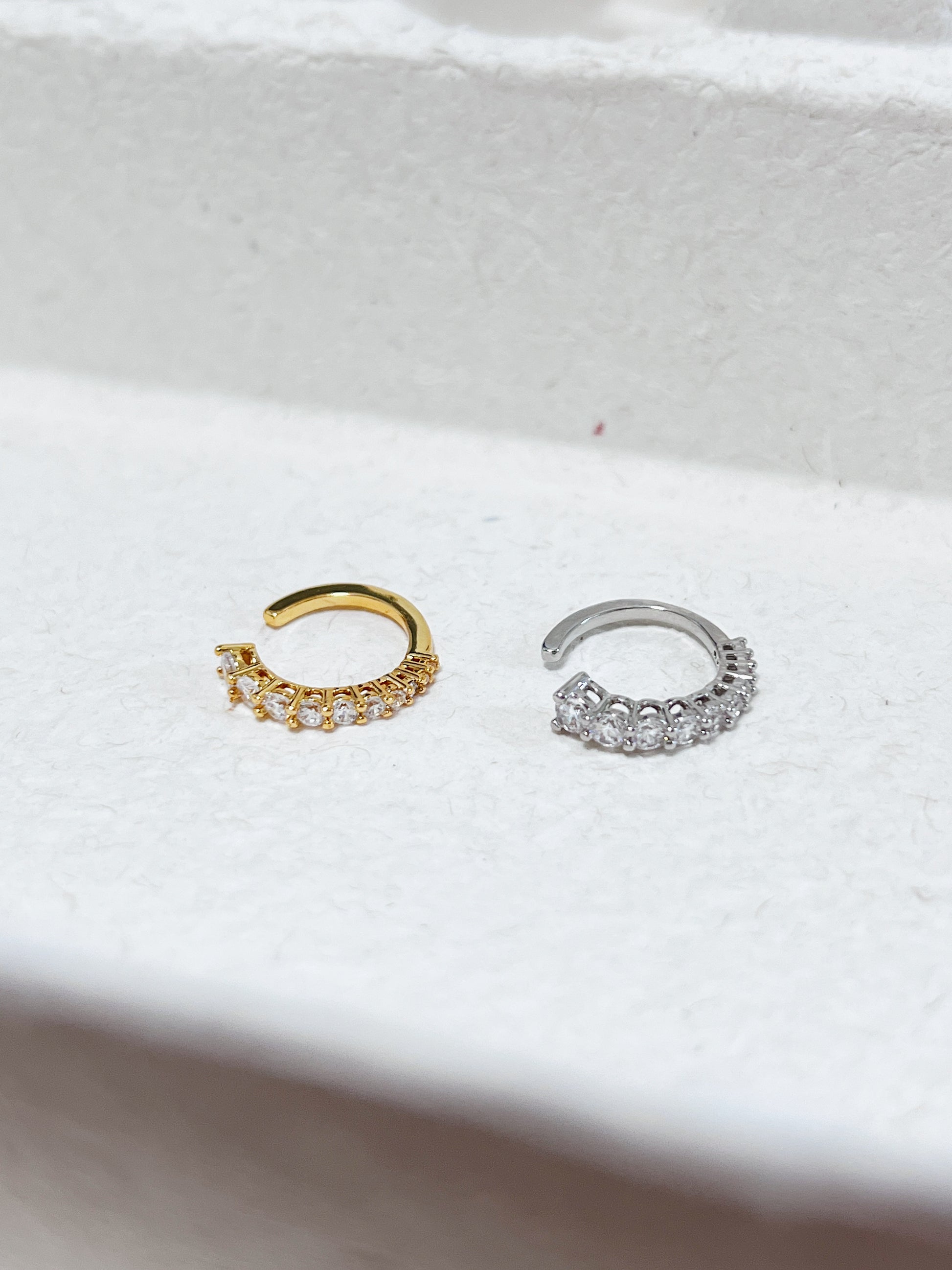 Emily 1-layer Pavé Cuff in 18k Gold on a minimalist background.