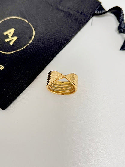 316L surgical stainless steel crossover ring with a thick yellow gold finish