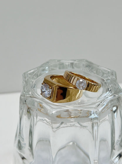 Close-up of 5A cubic zirconia center stone on a gold chunky ring.