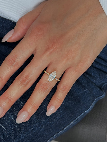Engagement-style shot of Kinn ring on hand.