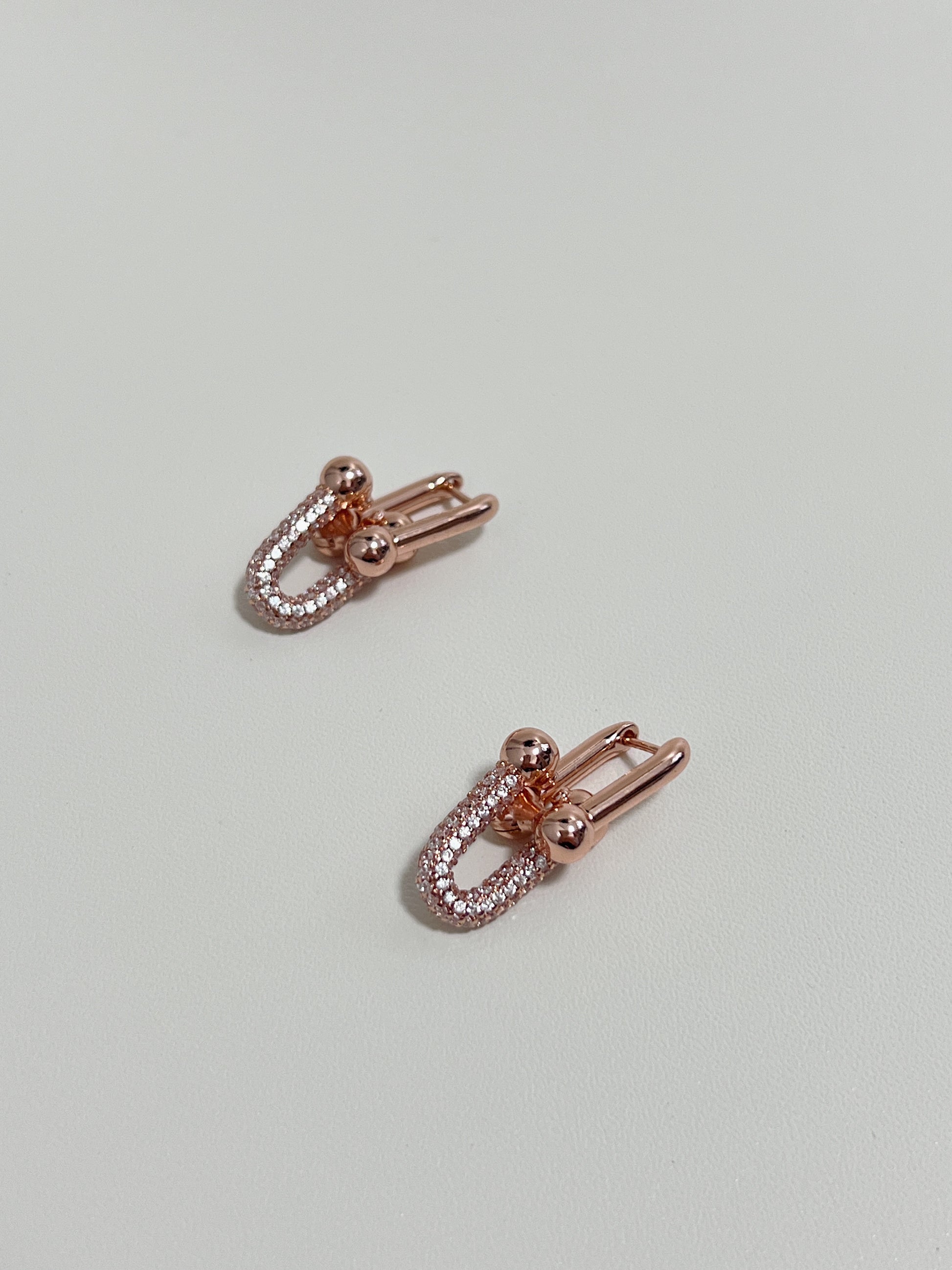 Handcrafted rose gold link earrings for weddings and special occasions.