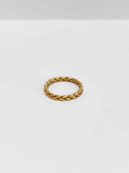 Gold braided ring in 3mm on a white background