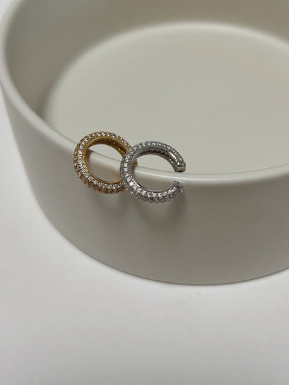 Side profile of Anika sculptural quad-row ear cuff.