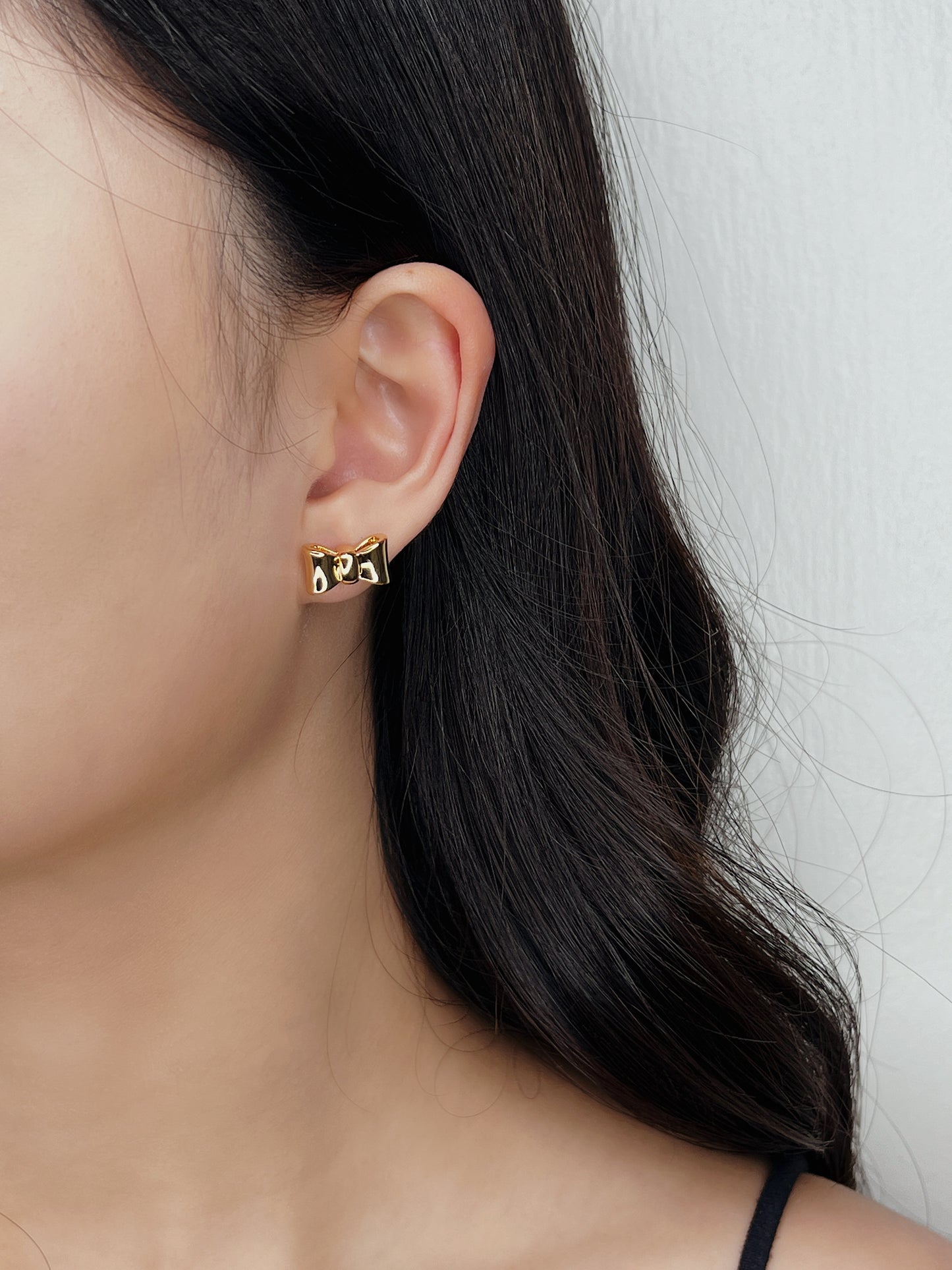 Sora Bow Gold Stud Earrings