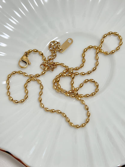 Gold chain necklace, stylish layering piece, rice beads, elegant design, cute layering necklace, everyday chain necklace