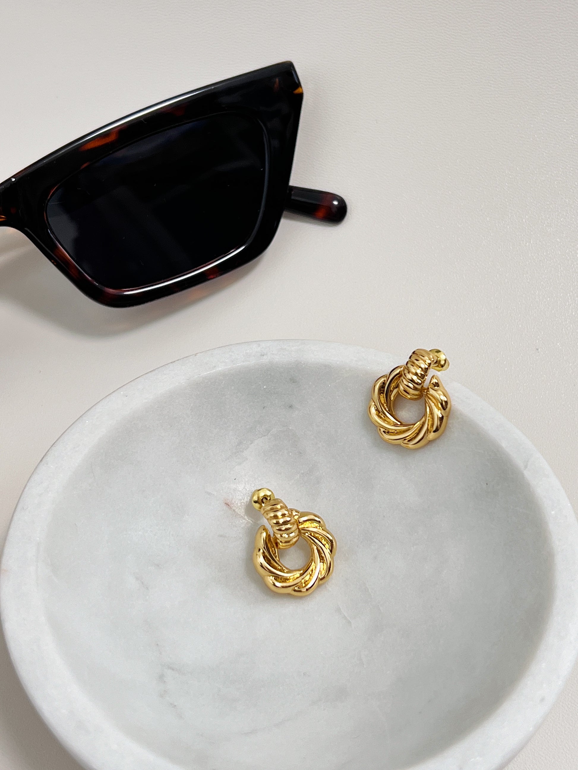 Trendy 18k gold plated brass mini knot earrings, perfect for adding a touch of elegance.