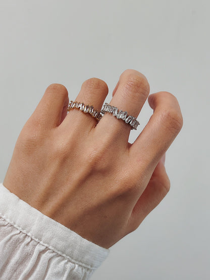 Close up of model hand showcasing the light-catching fire of 5A baguette stones