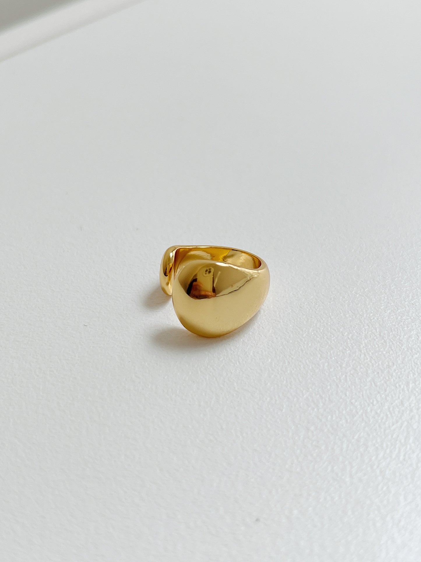 Tobi gold abstract cuffs, detail shot.