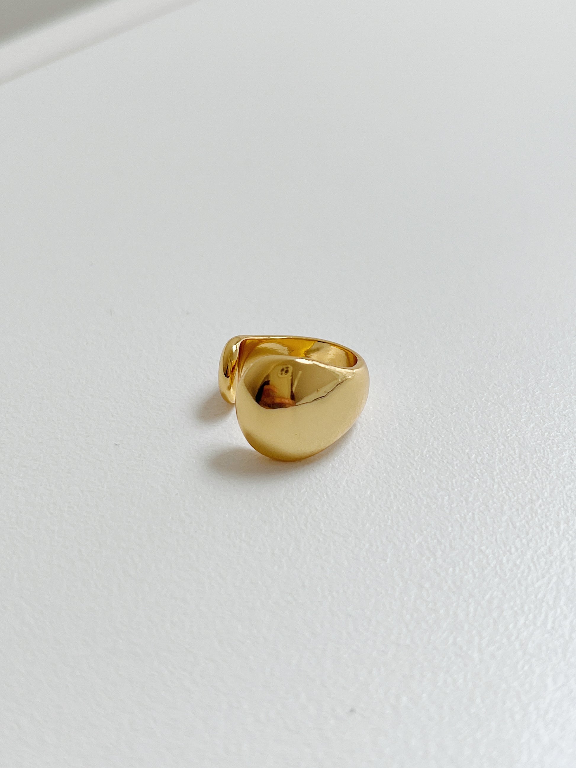 Tobi gold abstract cuffs, detail shot.