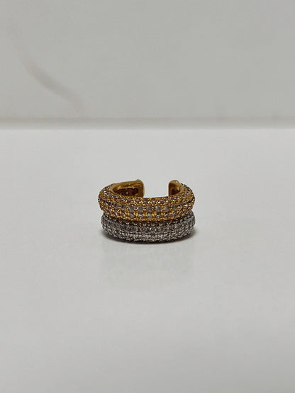 Macro shot of pavé light refraction of anika pave ear cuff.