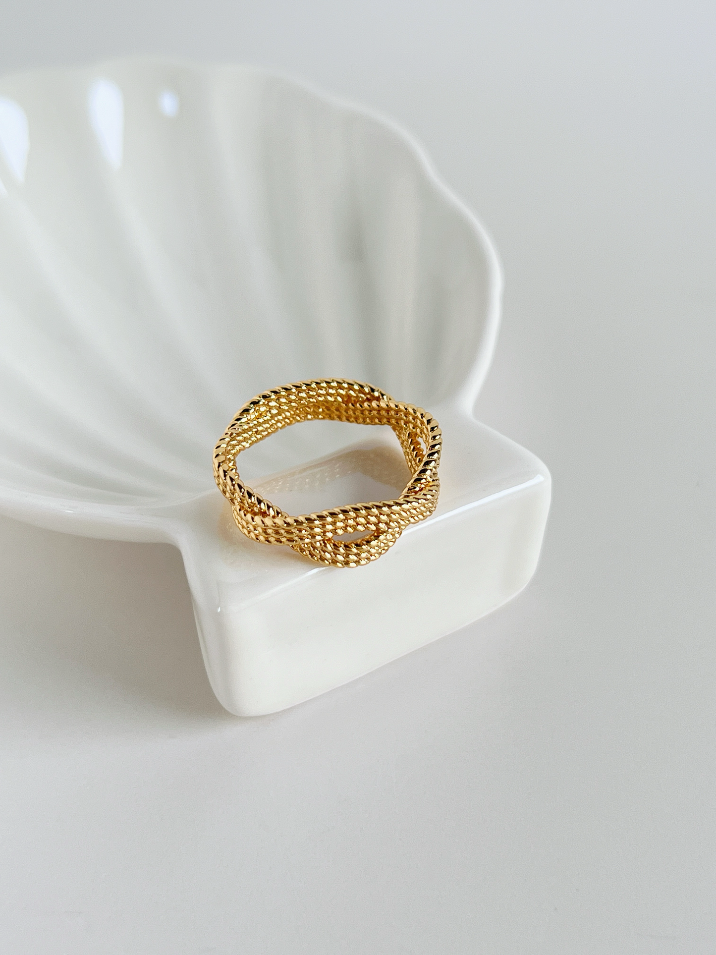 Aurorette braided ring in 18k gold plating over a solid brass core