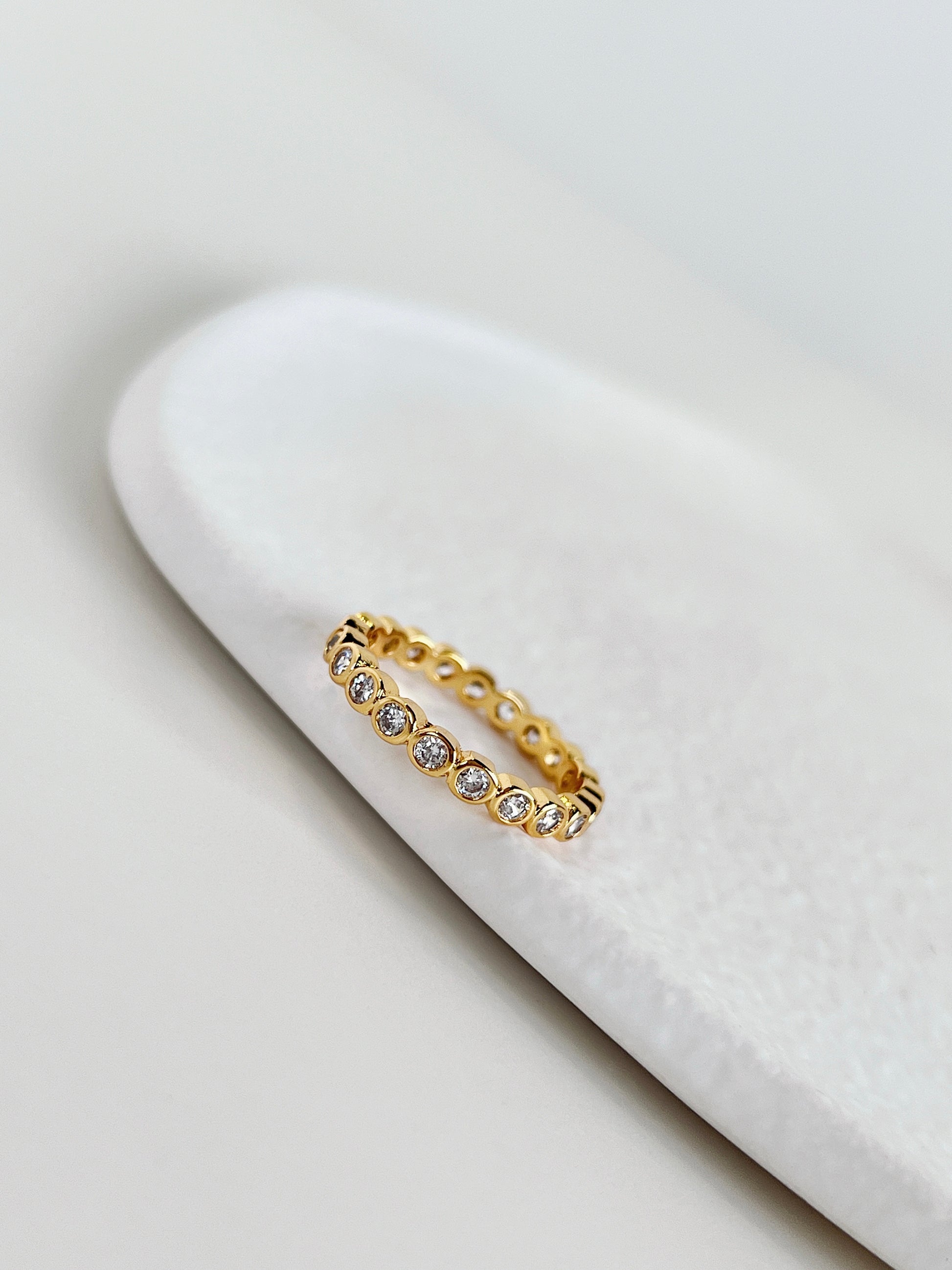 Nicola bezel eternity ring in tarnish free 18k gold pvd over brass core