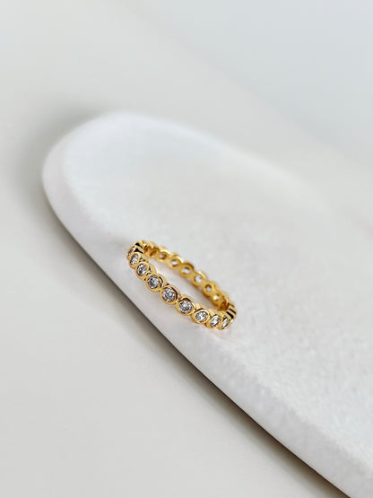 Nicola bezel eternity ring in tarnish free 18k gold pvd over brass core