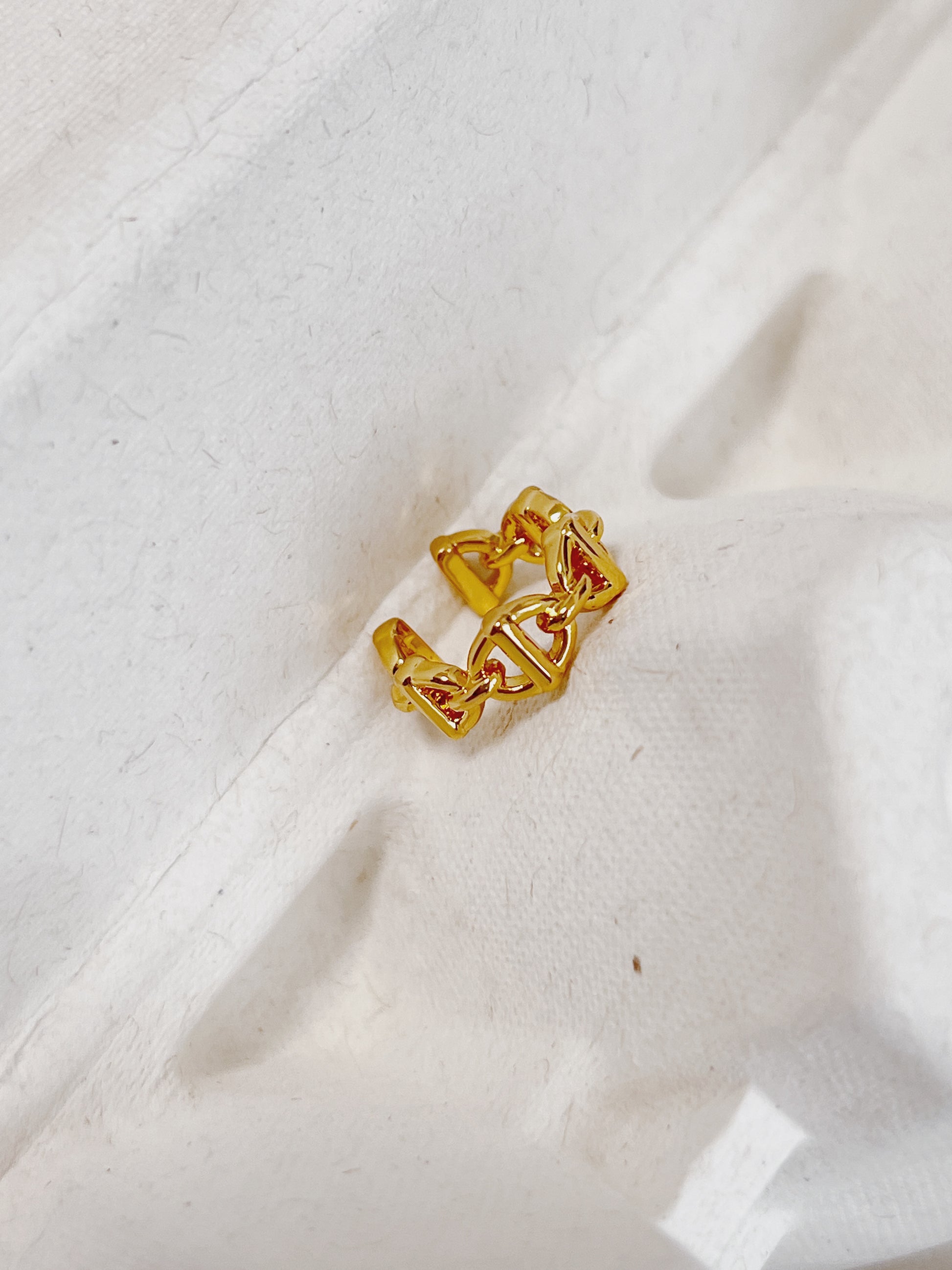 Top-down view showing the symmetrical linked pattern of the heritage-inspired Windsor cuff.