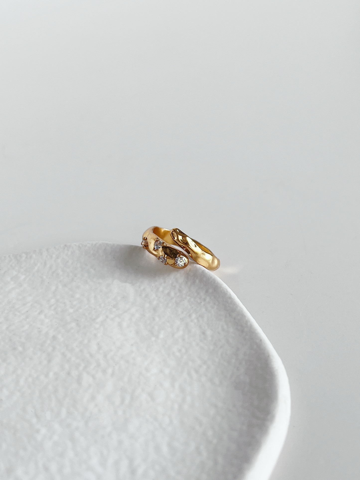 Doris asymmetrical hammered bypass ring in 18k gold pvd tarnish resistant finish
