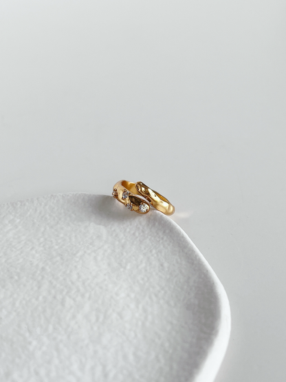 Doris asymmetrical hammered bypass ring in 18k gold pvd tarnish resistant finish