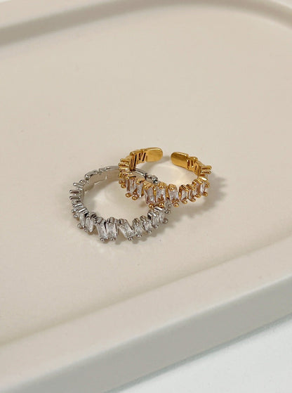 Lizza eternity baguette ring featuring staggered 5A cubic zirconia stones