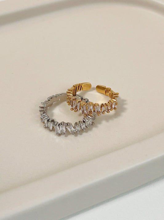 Lizza eternity baguette ring featuring staggered 5A cubic zirconia stones