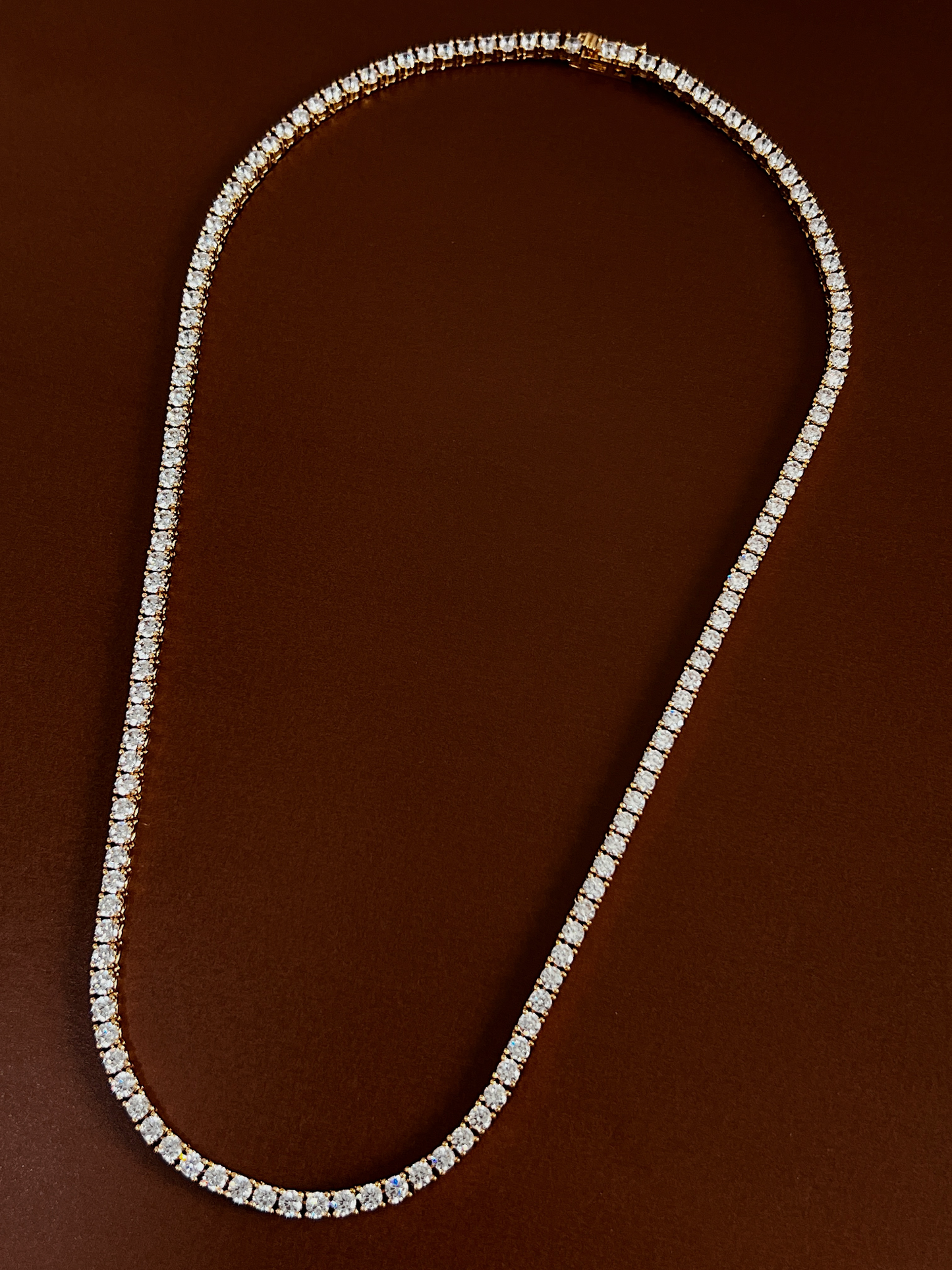 Tarnish resistant everyday luxury crystal strand curved smoothly on flat surface