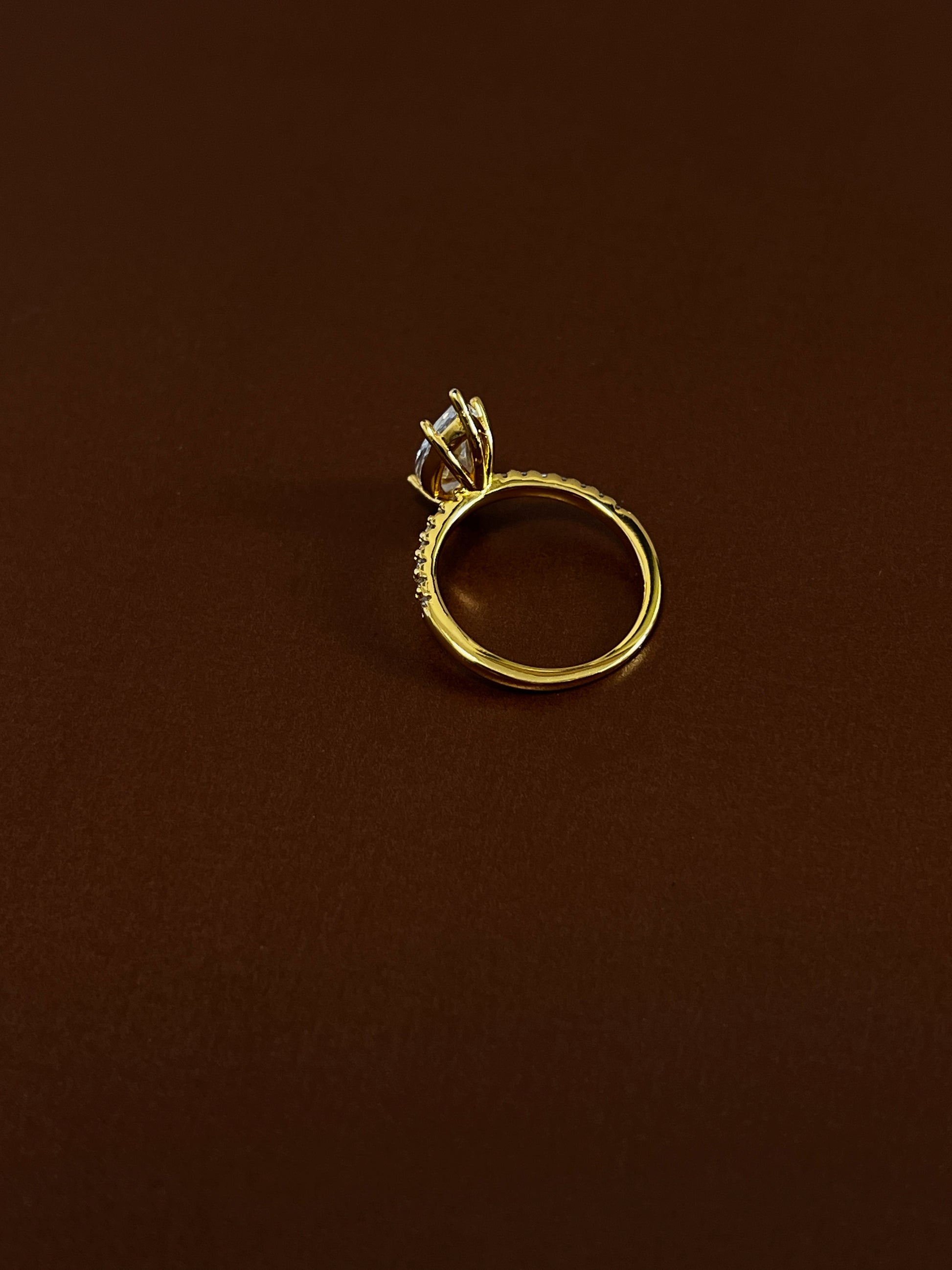 Back view of 2-carat marquise moissanite setting on 18k gold vermeil band.