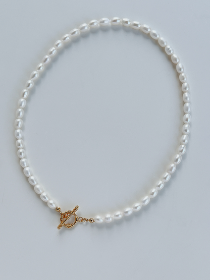 Waterproof daily wear pearl necklace with intricate vintage style column textured T bar clasp