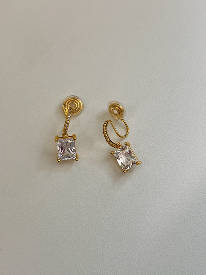 Candice 23mm length drop clip-on earring displayed flat on white surface