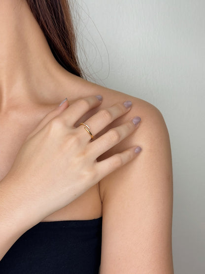 Ava sculptural gold wrap ring worn by a model for a quiet luxury aesthetic