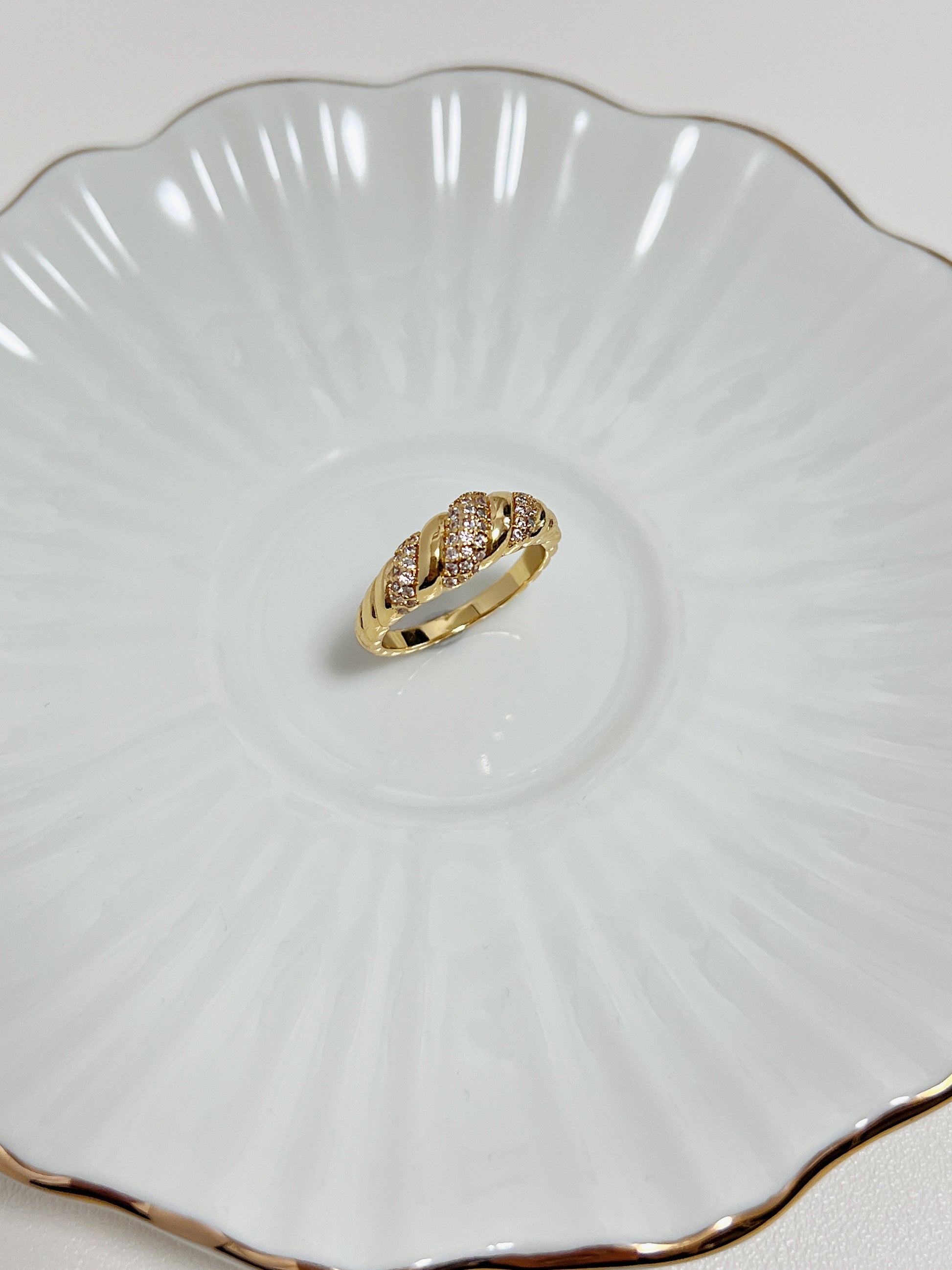 The Claudia gold ring showing its tapered band and smooth inner lining.