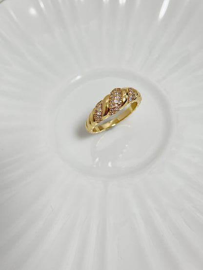 Macro shot of the high-grade 5A cubic zirconia stones in the pavé croissant ring.