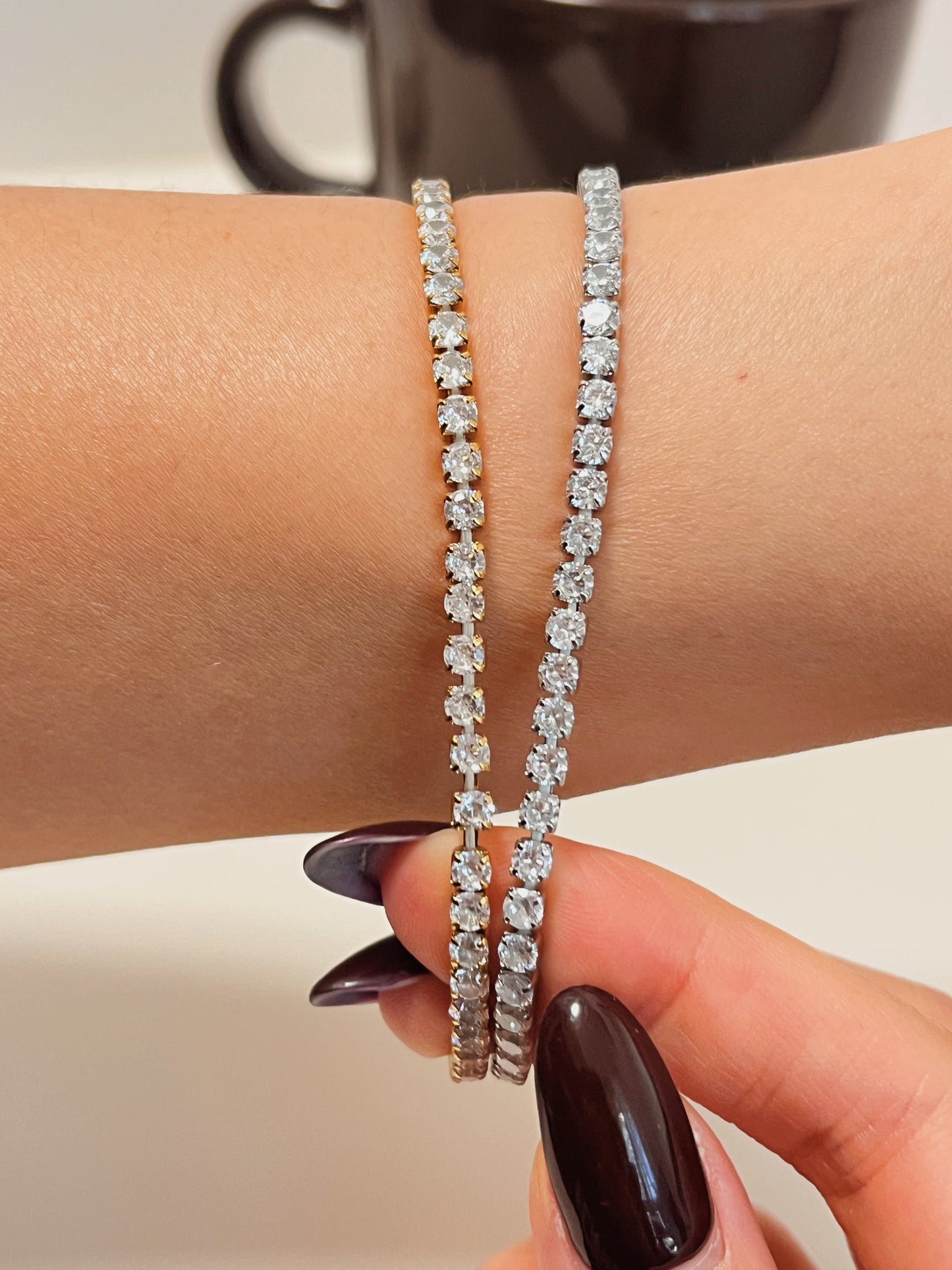 Tarnish-resistant performance-grade gold finish on the 3mm elastic diamond-alternative bracelet.