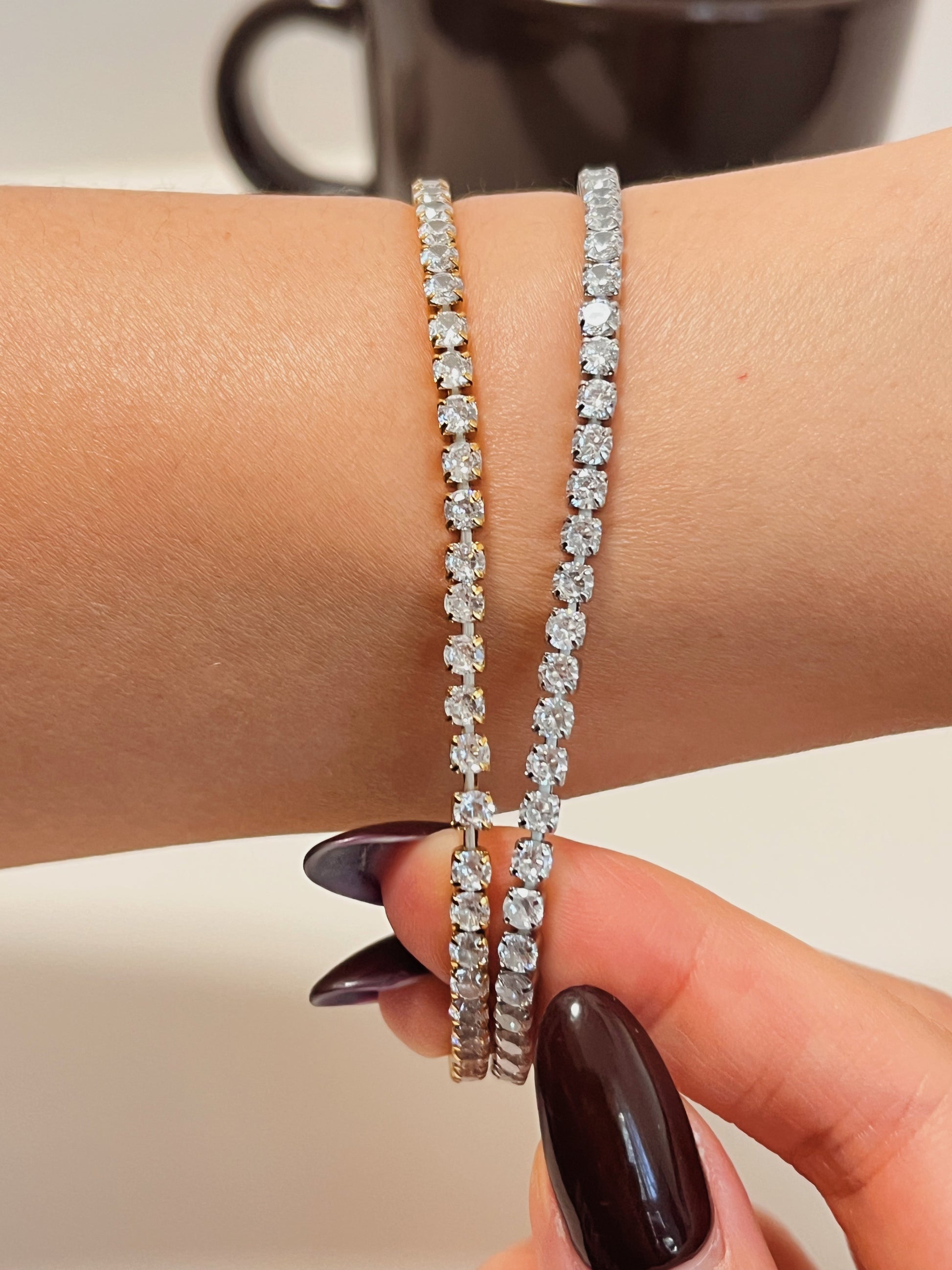 Tarnish-resistant performance-grade gold finish on the 3mm elastic diamond-alternative bracelet.