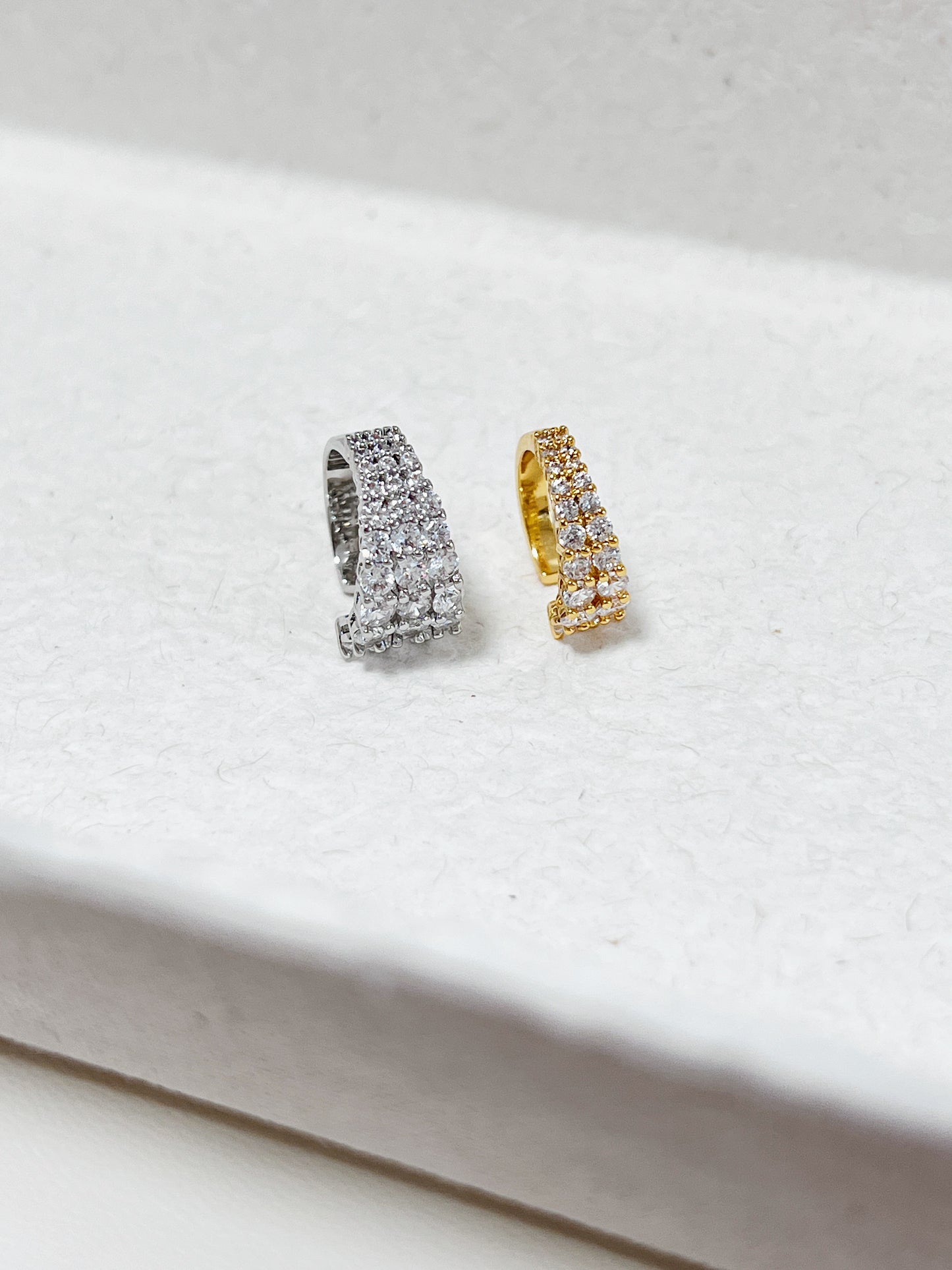 Side-by-side of Emily Gold and Silver double-layer ear cuffs