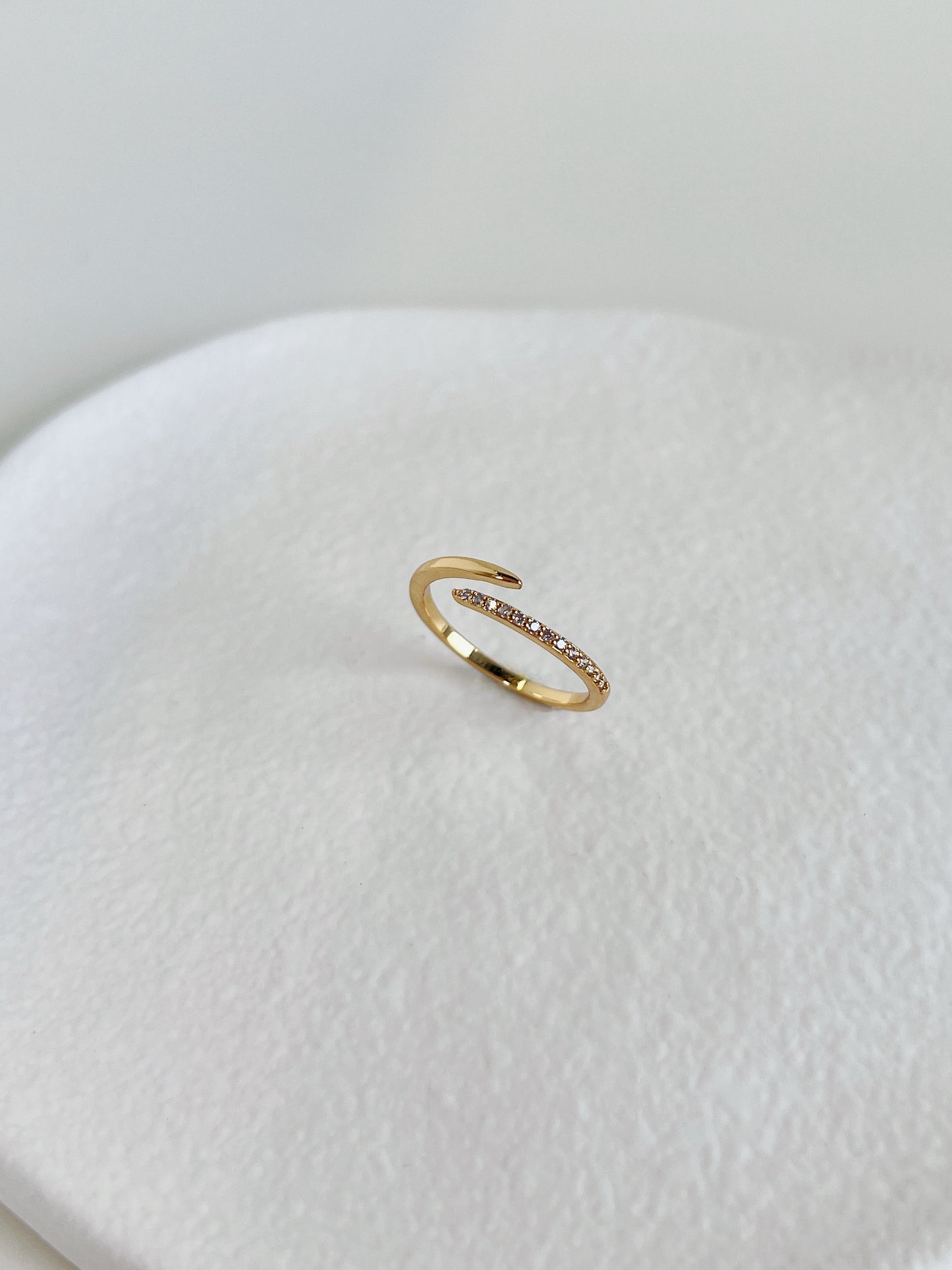 Durable gold plated ring by Aurous Atelier showing the open ended bypass design