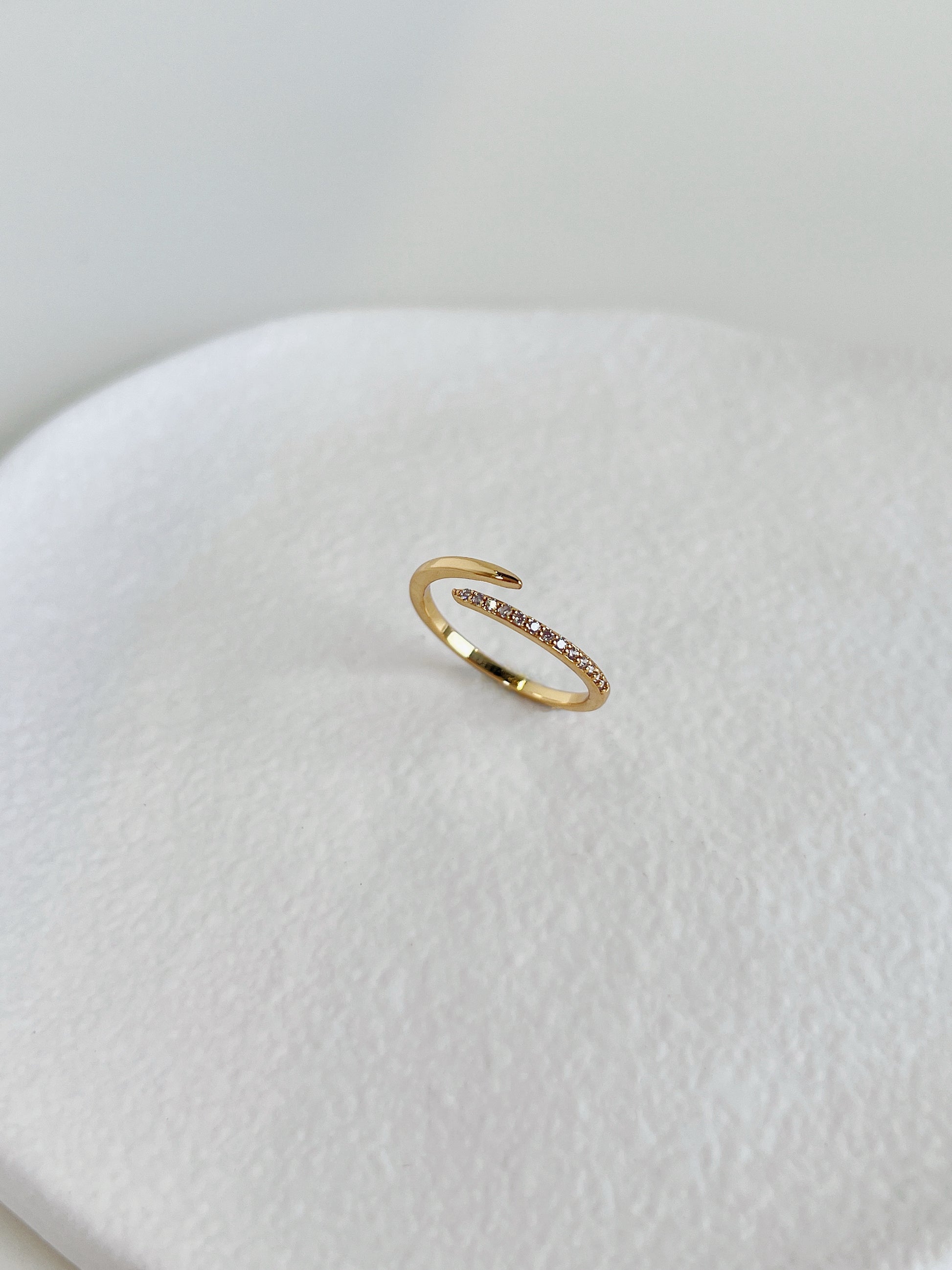 Durable gold plated ring by Aurous Atelier showing the open ended bypass design