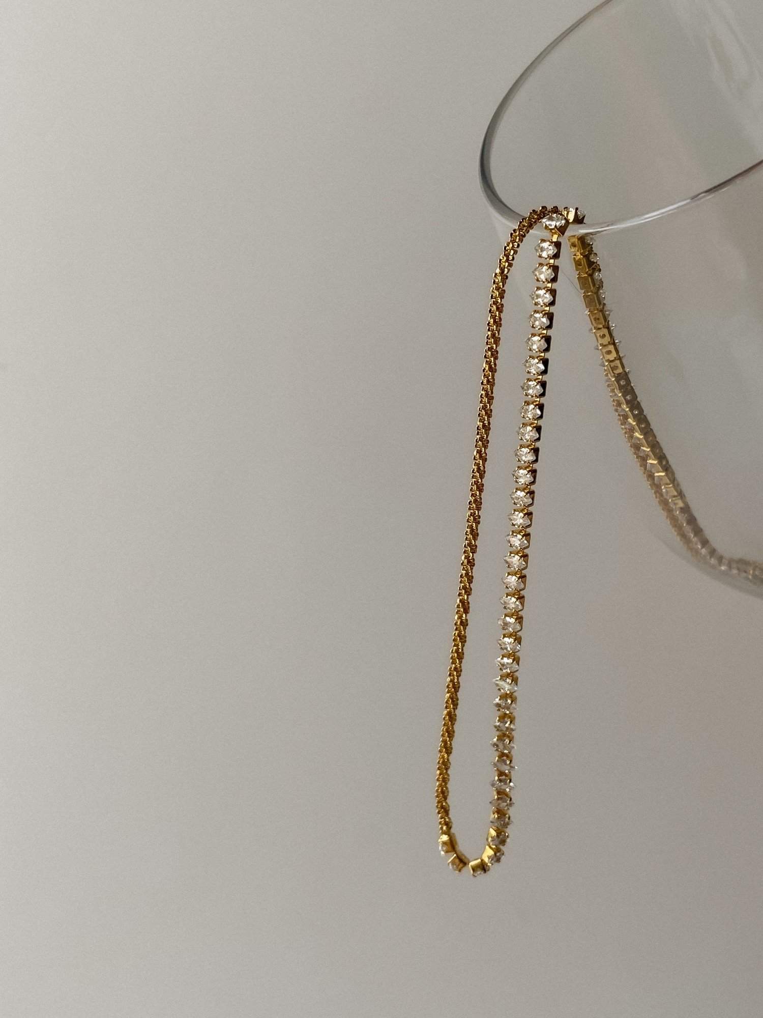 Durable moisture resistant fashion jewellery crystal choker sitting on premium display glass