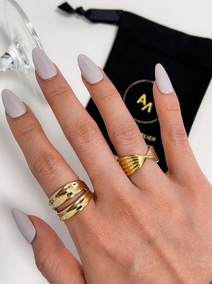Minimalist model hand shot featuring the Renee gold double ring styling idea
