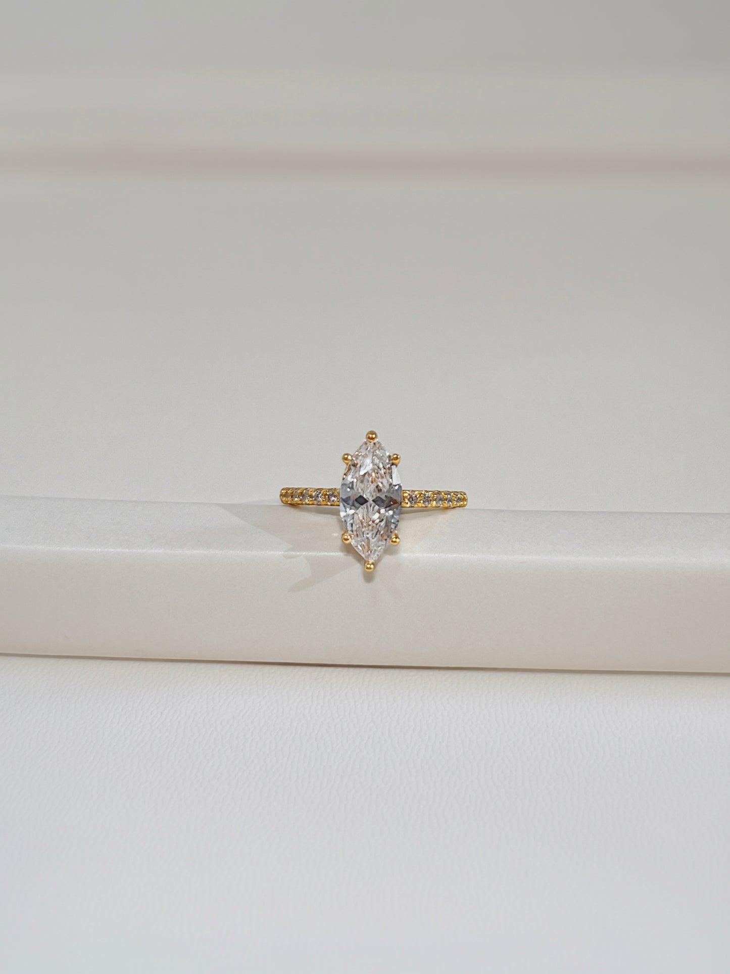Kinn ring in natural light showing the fire of the 2ct moissanite stone.