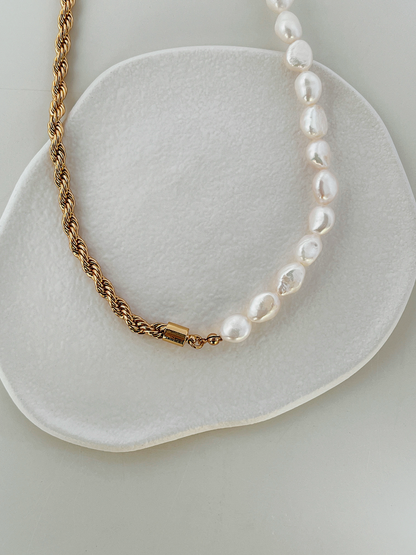 Close up of 18k gold PVD water resistant French rope twist chain texture