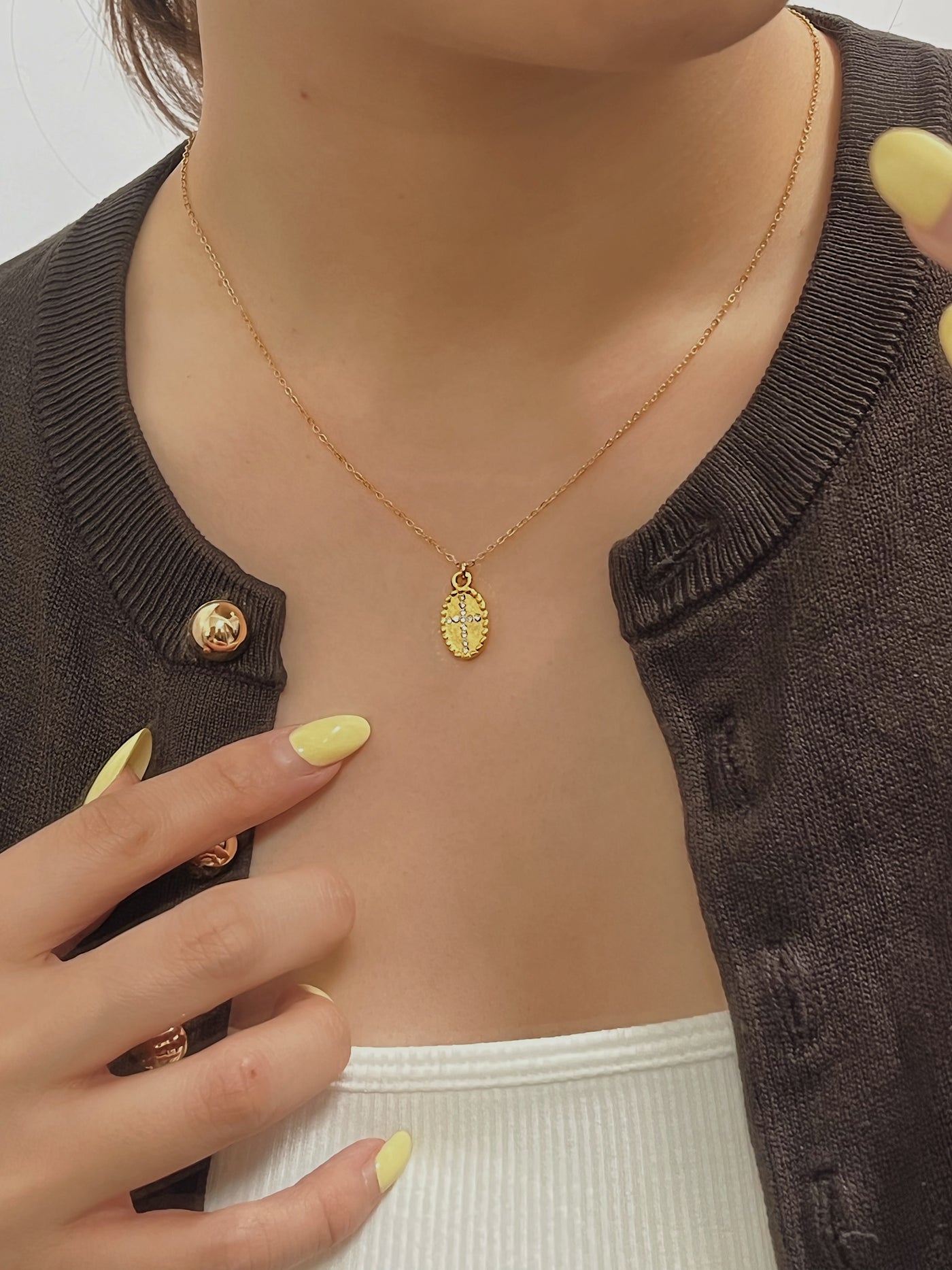 Editorial styling for Gianna Oval Cross Medallion Necklace
