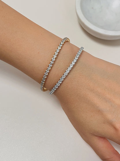 Styling inspiration showing an elegant wrist stack featuring a set of 3mm Elastic Tennis Bracelet.