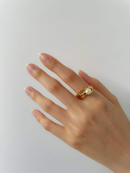 Hand model wearing Lorna pearl ring on index finger for a modern look