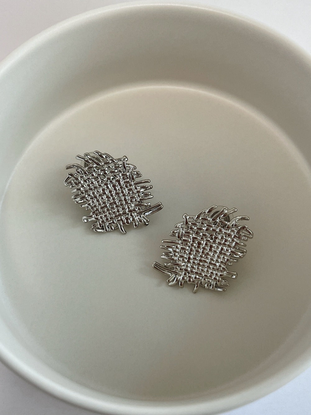Silver rhodium plated Hazel woven textured clip-on earrings pair