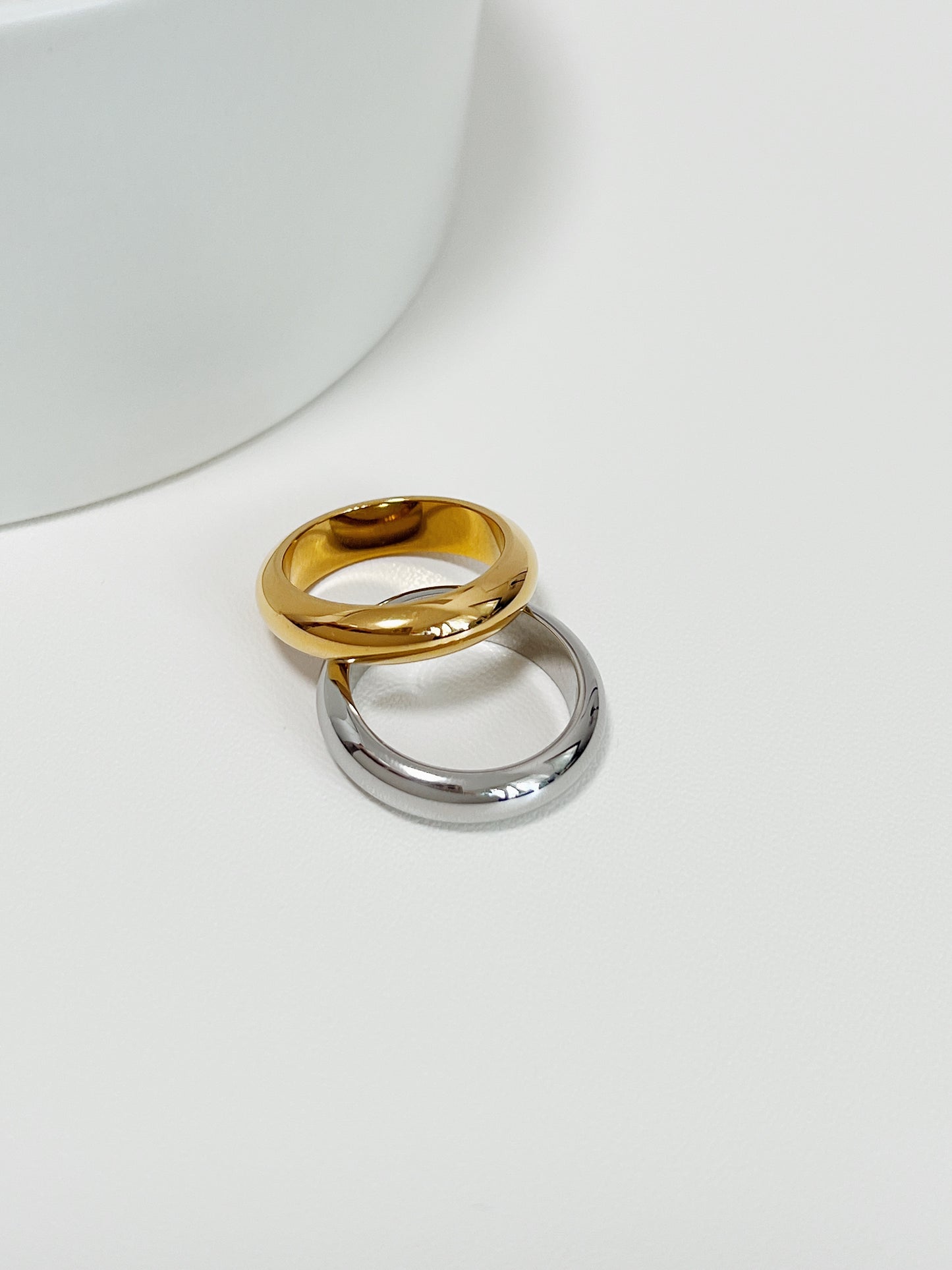 Tarnish resistant 18k gold plated brass everyday ring on white surface