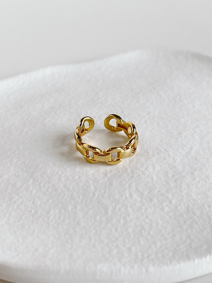 Chunky gold chain rings for women highlighting the adjustable open back