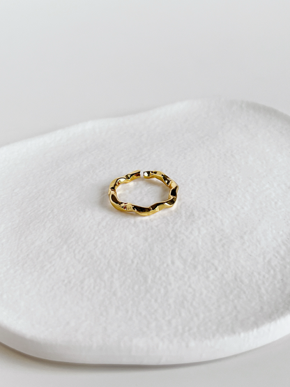 Tarnish-free 18k gold-plated everyday ring shown on soft display