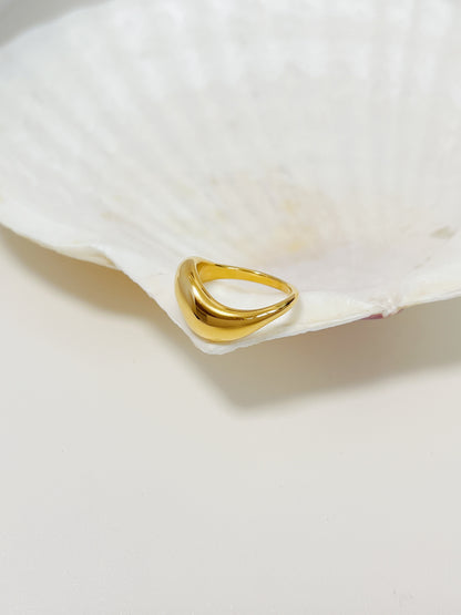 Tarnish-free 18k gold-plated stainless steel wave dome ring on white display