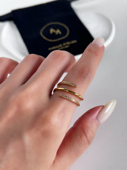 Seamless triple-stack ring effect on model's hand in 18k Gold
