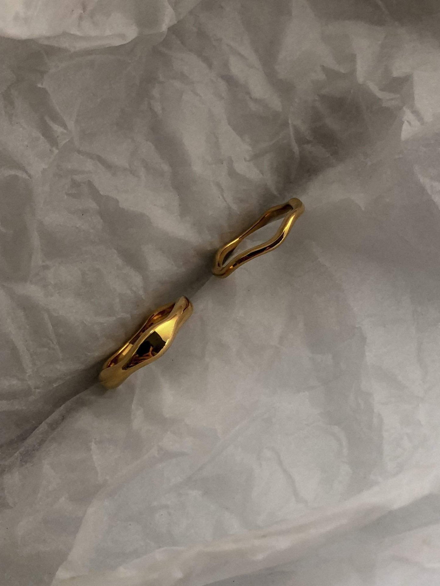 Architectural grade stainless steel ring with premium 18k gold plating.